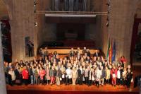 Los asistentes al homenaje, sobre el escenario del complejo cultural San Francisco